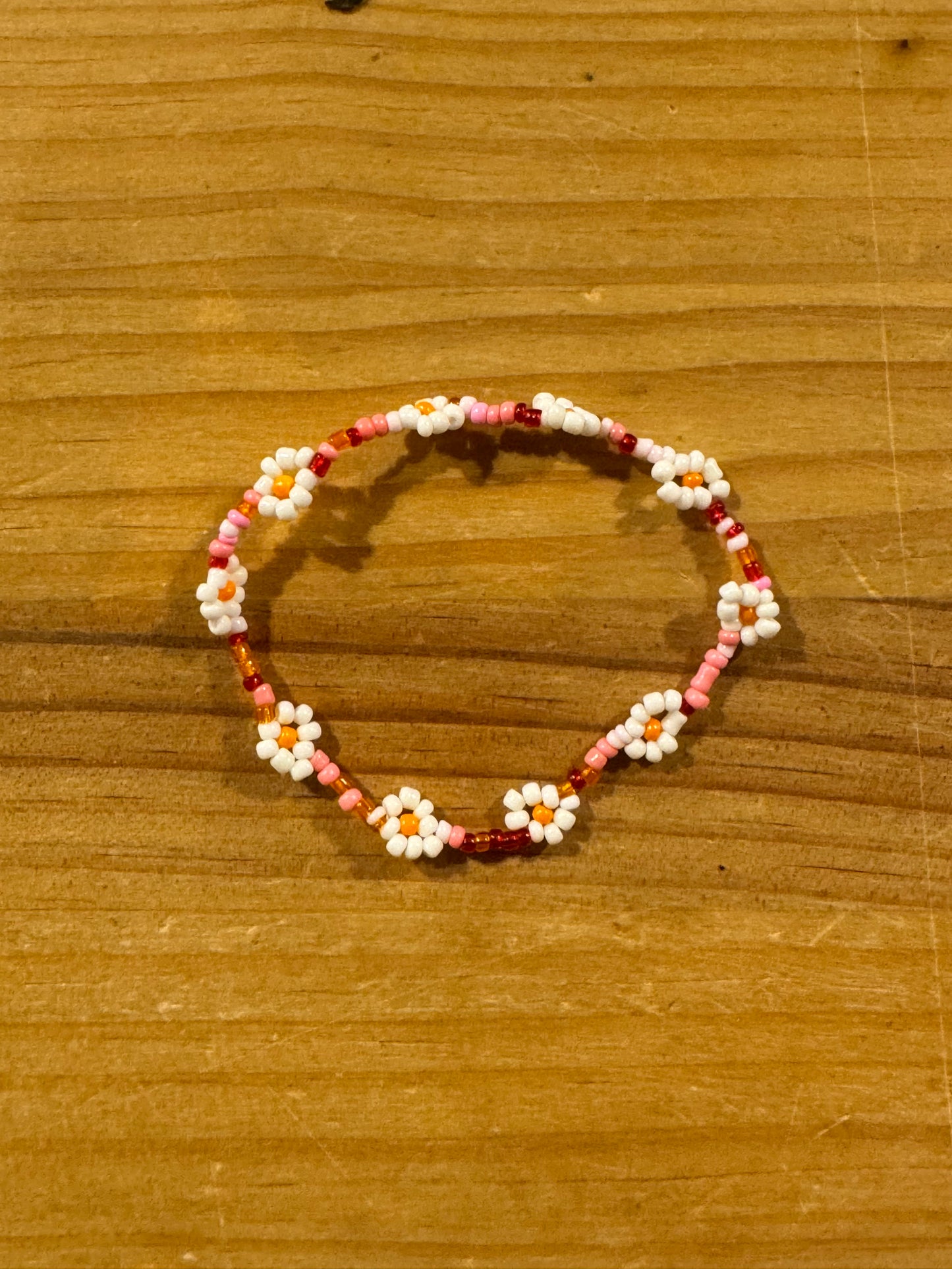 Pulsera Cuentas Bolitas Rosa y Granate con Flores Blanco y Naranja