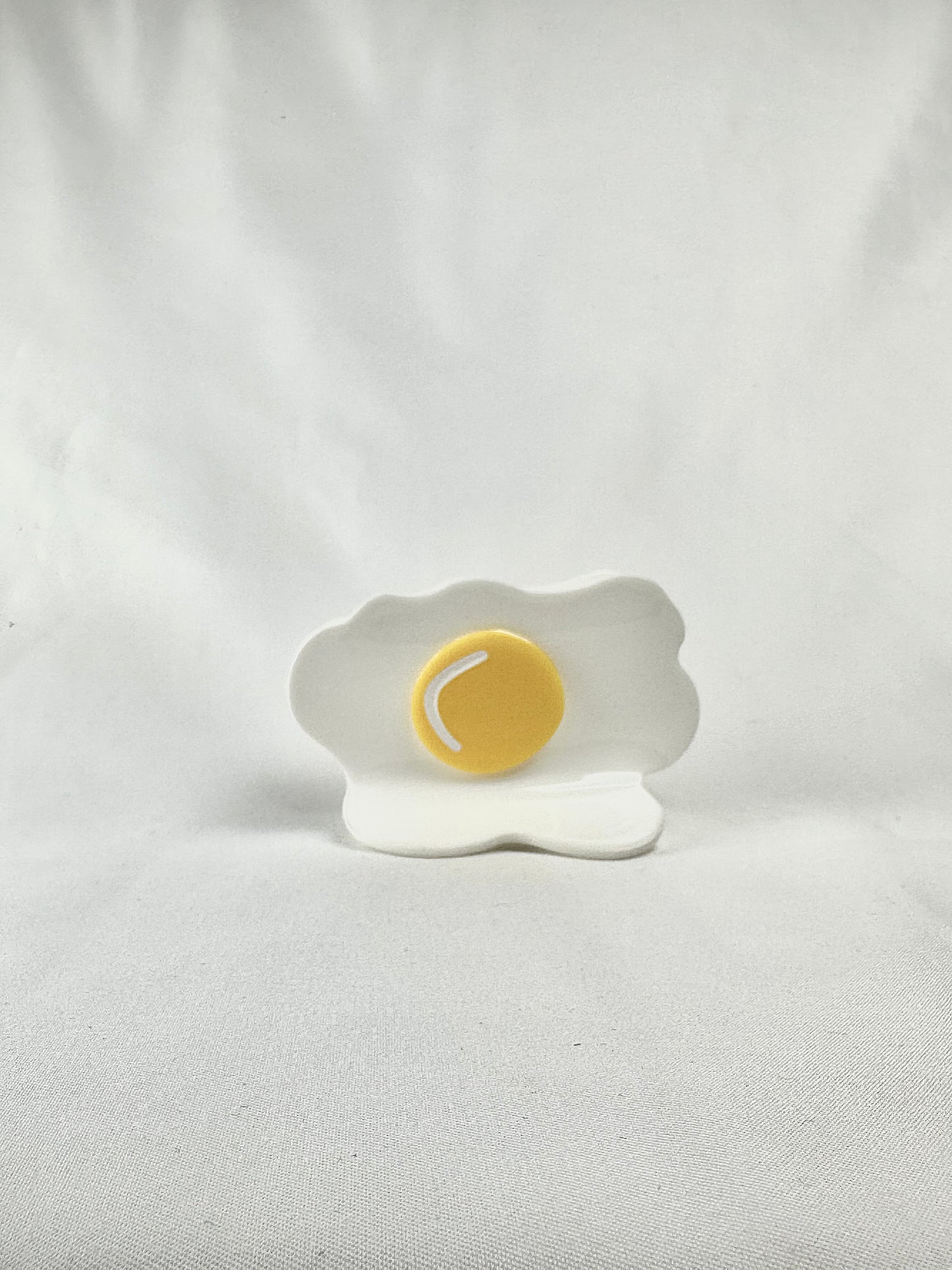 Pinza de Pelo Huevo Frito