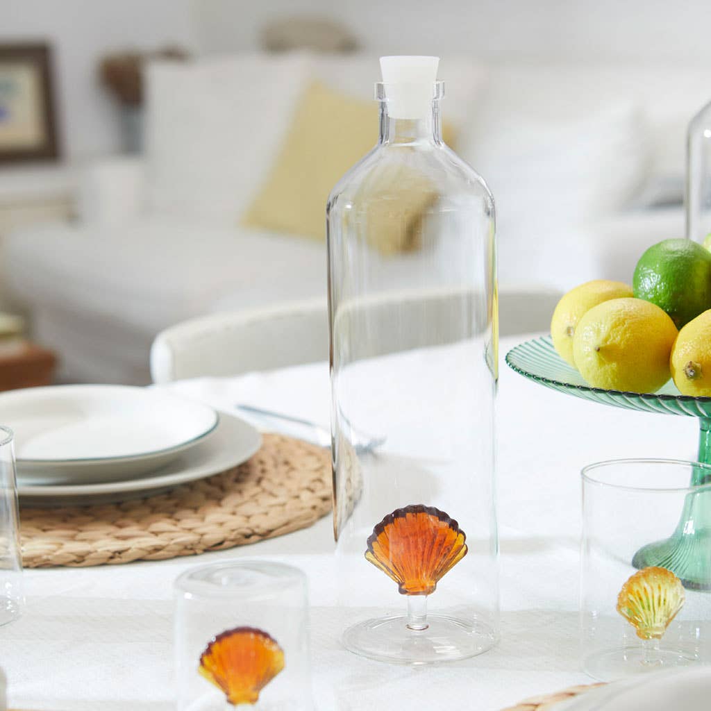 Botella Agua Cristal con Figura Concha Marrón
