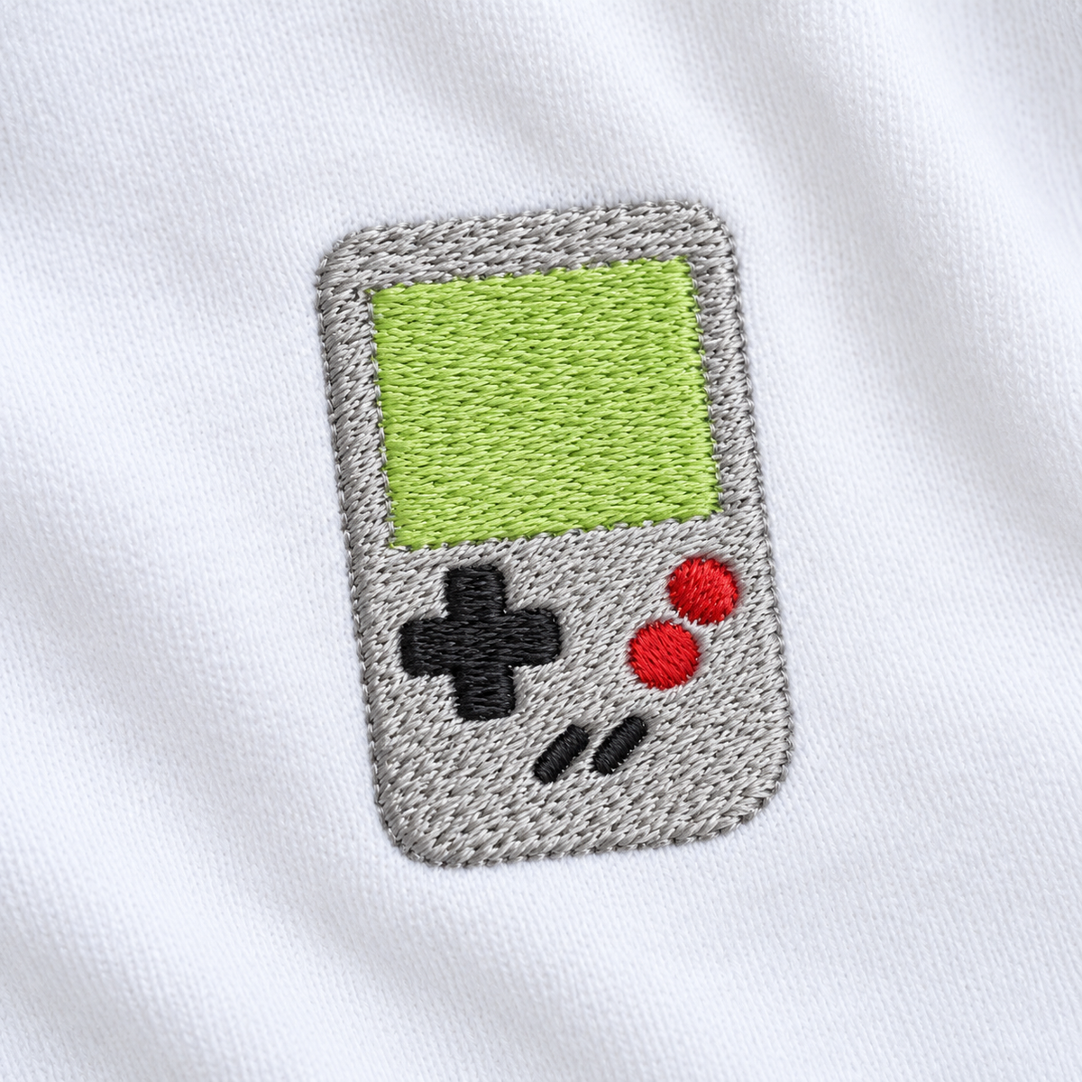 Primer plano del bordado Game Boy