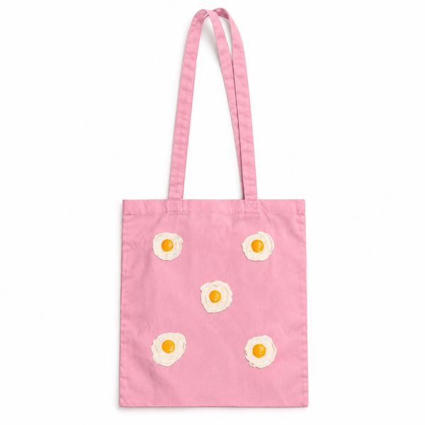 Tote bag Rosa con 5 huevos fritos en relieve sobre fondo blanco