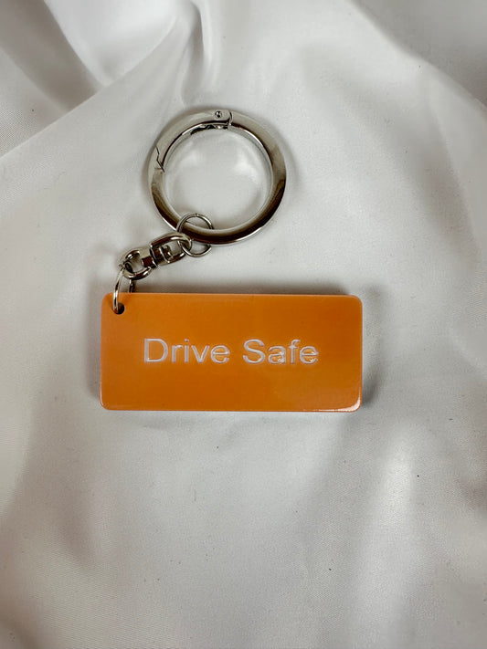 Llavero Drive Safe Naranja Melocotón