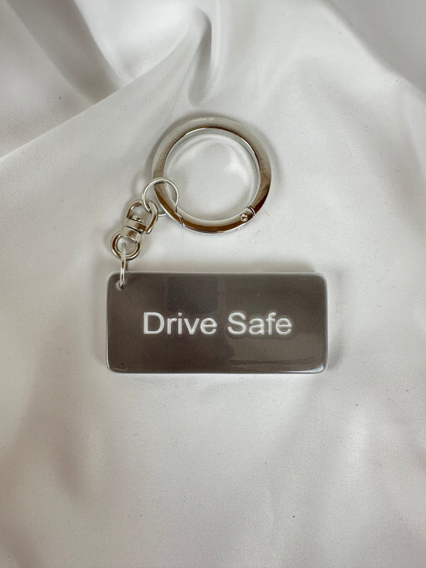 Llavero Drive Safe Gris