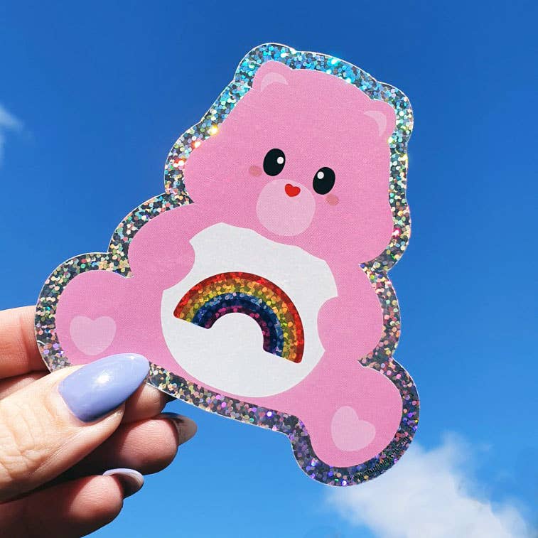 Etiqueta brillante Care Bear enviando arcoíris