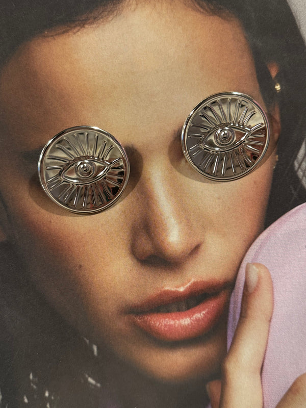 Pendientes Redondos Ojos Plateados