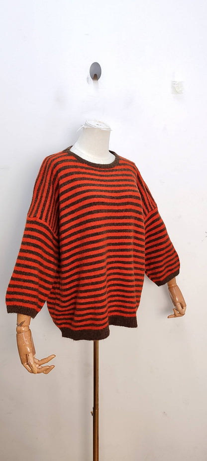 Jersey de punto bicolor amarillo y chocolate