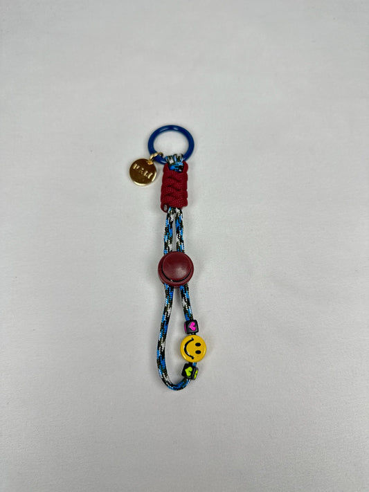 Llavero Smiley Azul con Marrón