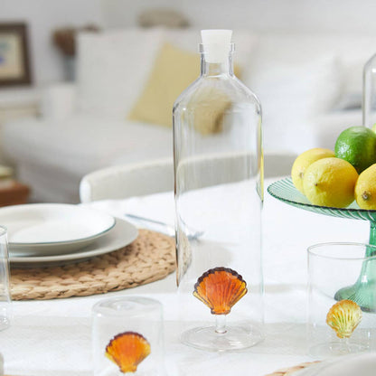 Botella Agua Cristal con Figura Concha Marrón
