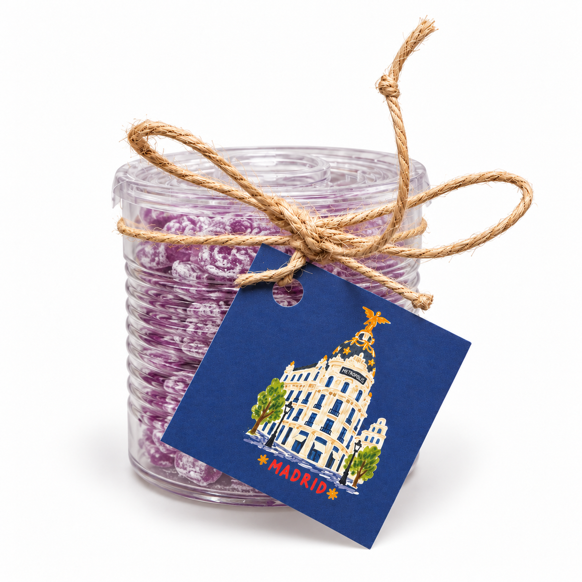 Bote de caramelos de violeta con etiqueta Edificio Metrópolis