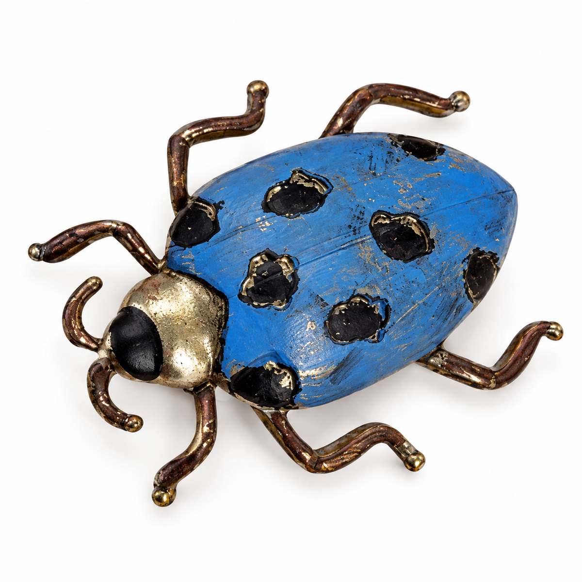 Broche insecto azul con detalles dorados sobre fondo blanco
