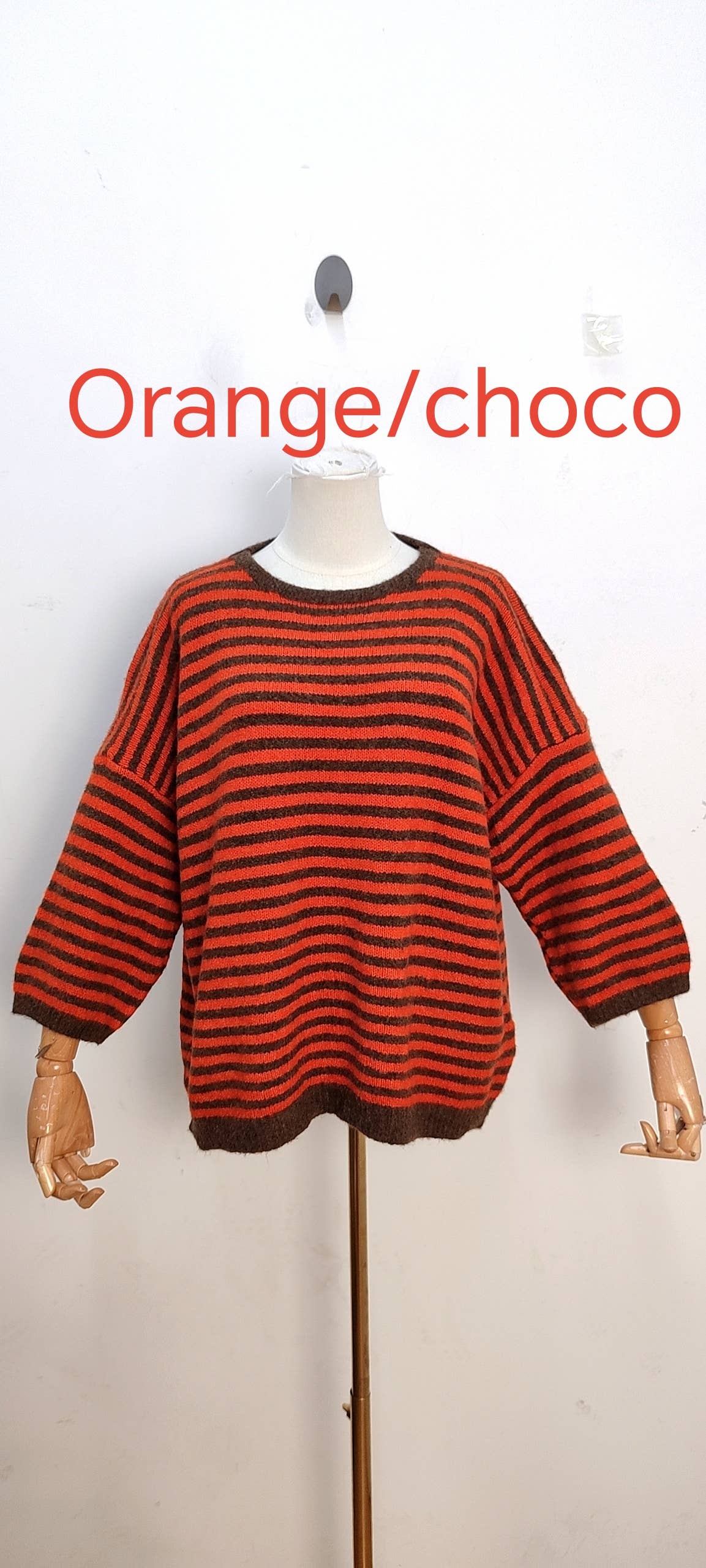 Jersey de punto bicolor amarillo y chocolate
