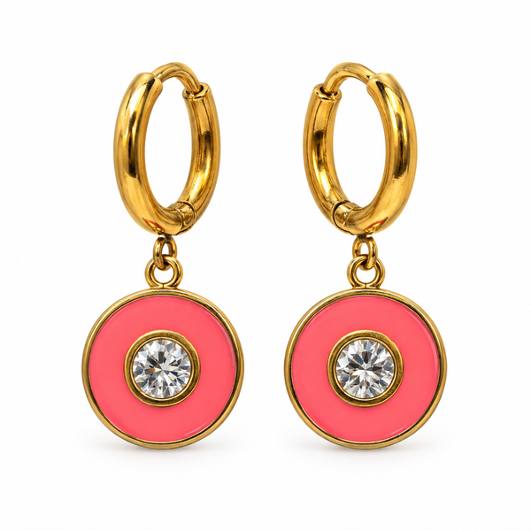 Par de pendientes rosa sobre fondo blanco