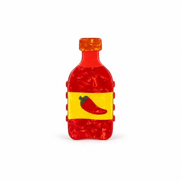 Pinza para el Pelo Botella de Salsa Picante — foto frontal de estudio sobre blanco
