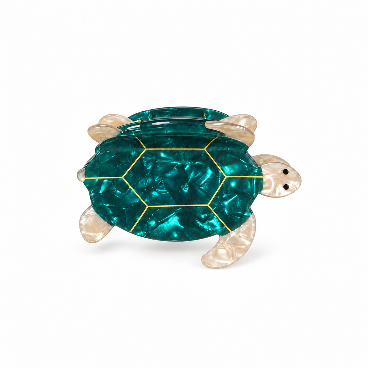 Pinza Tortuga centrada sobre fondo blanco