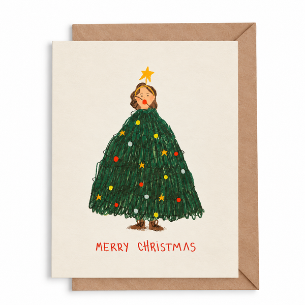 Postal Merry Christmas con mujer árbol de Navidad y sobre kraft