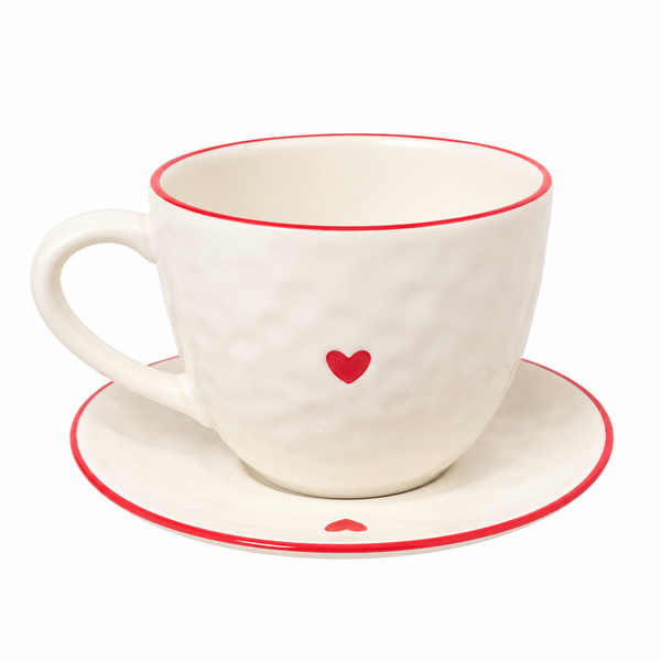 Taza blanca con corazón rojo y plato