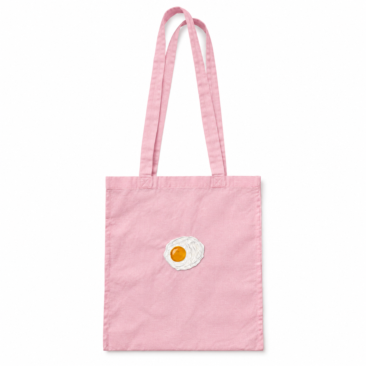 Tote bag Rosa con 1 huevos fritos en relieve sobre fondo blanco